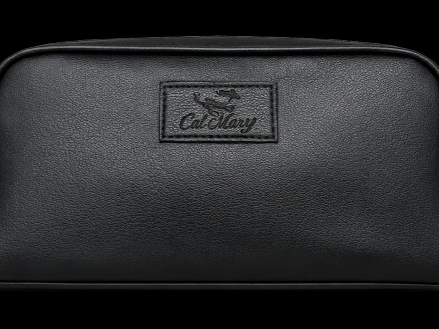 Blind embossed logo on synthetic PU wash bag production sample