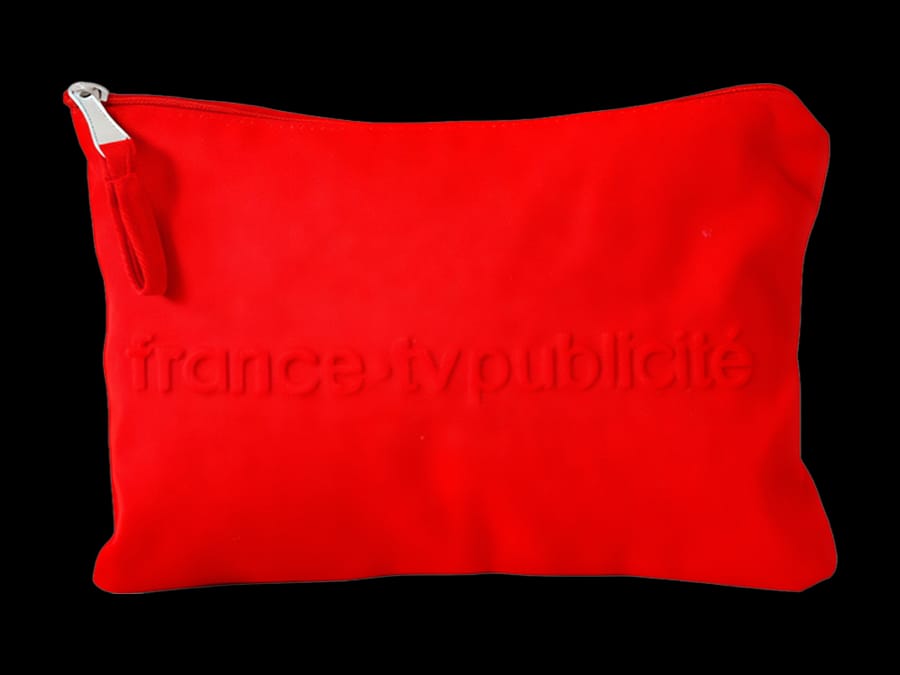 Embossed logo zip pouch production sample
